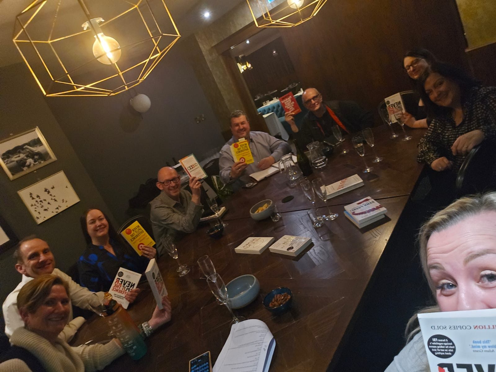 Chester Business Book Club members discussing Never Split the Difference by Chris Voss